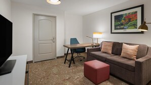 Suíte, 1 quarto | Área de estar