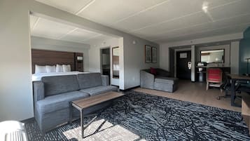 Suite, 1 King Bed, Non Smoking | In-room safe, desk, laptop workspace, iron/ironing board