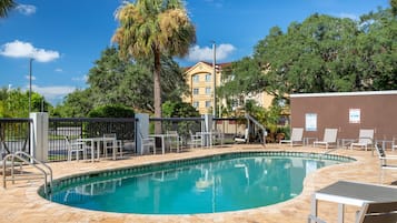 Outdoor pool, open 8:00 AM to 10:00 PM, sun loungers