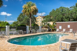 Outdoor pool, open 8:00 AM to 10:00 PM, pool loungers