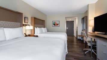 Pillowtop beds, desk, blackout drapes, iron/ironing board