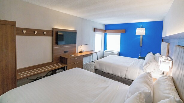 A hotel room with two beds, a desk, a chair, a television, and a window. - Holiday Inn Express & Suites Nashville - Brentwood I-65 by IHG (Brentwood)