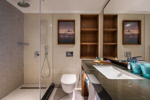 Shower, rainfall showerhead, free toiletries, hair dryer - Sea Tower by Isrotel Design (Tel Aviv)