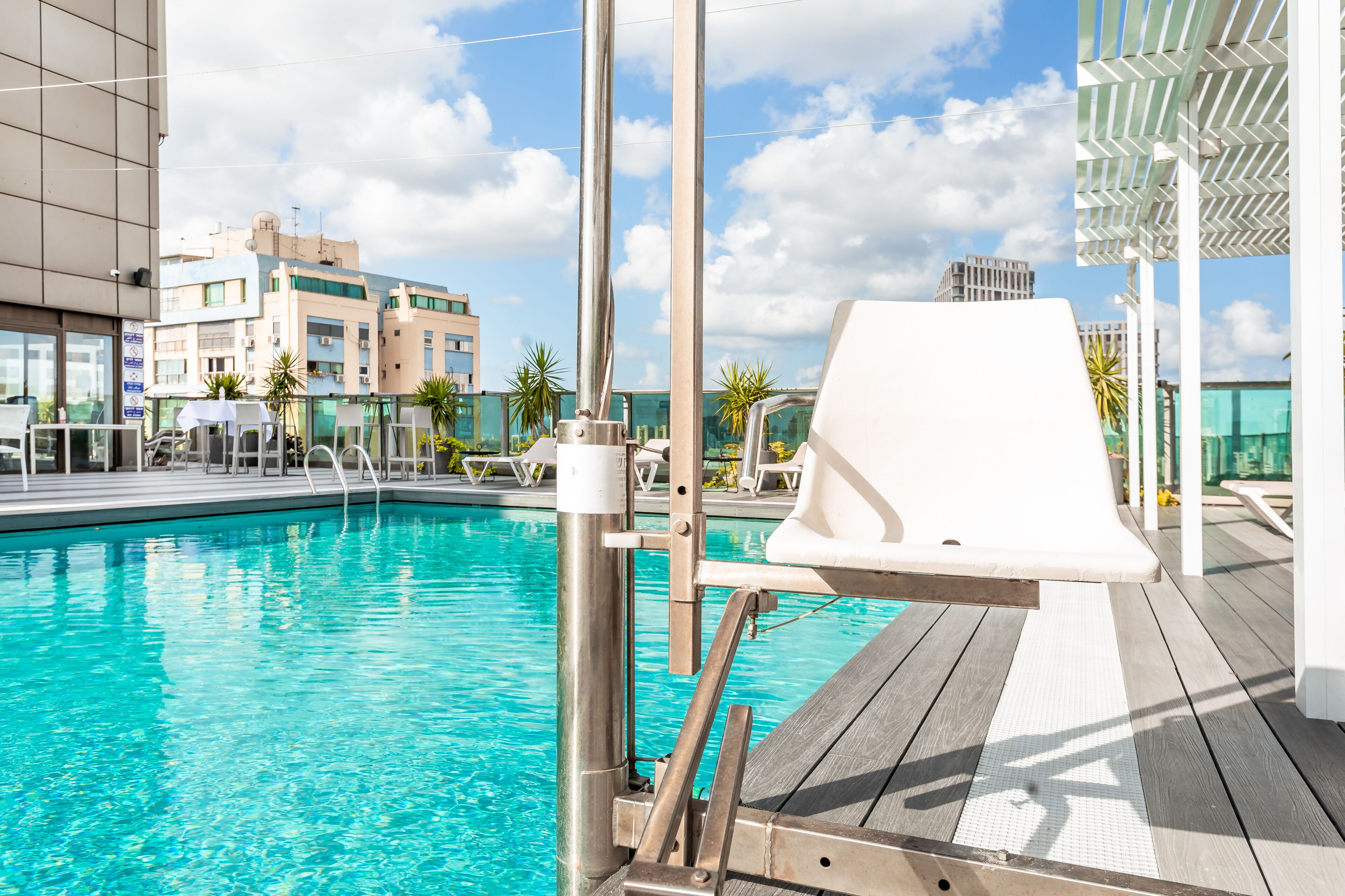 outdoor pool, open 10:00 am to 5:00 pm, pool umbrellas, pool loungers