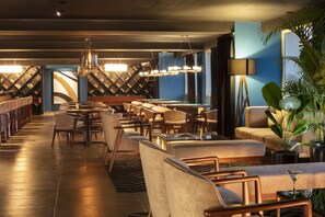 5 bars/lounges, poolside bar, beach bar