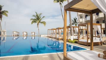 2 outdoor pools, free pool cabanas, pool umbrellas