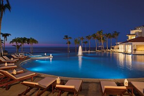2 outdoor pools, pool umbrellas, sun loungers