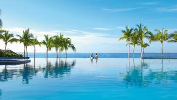 2 outdoor pools, pool umbrellas, sun loungers