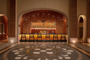 6 bars/lounges, 2 poolside bars, beach bar