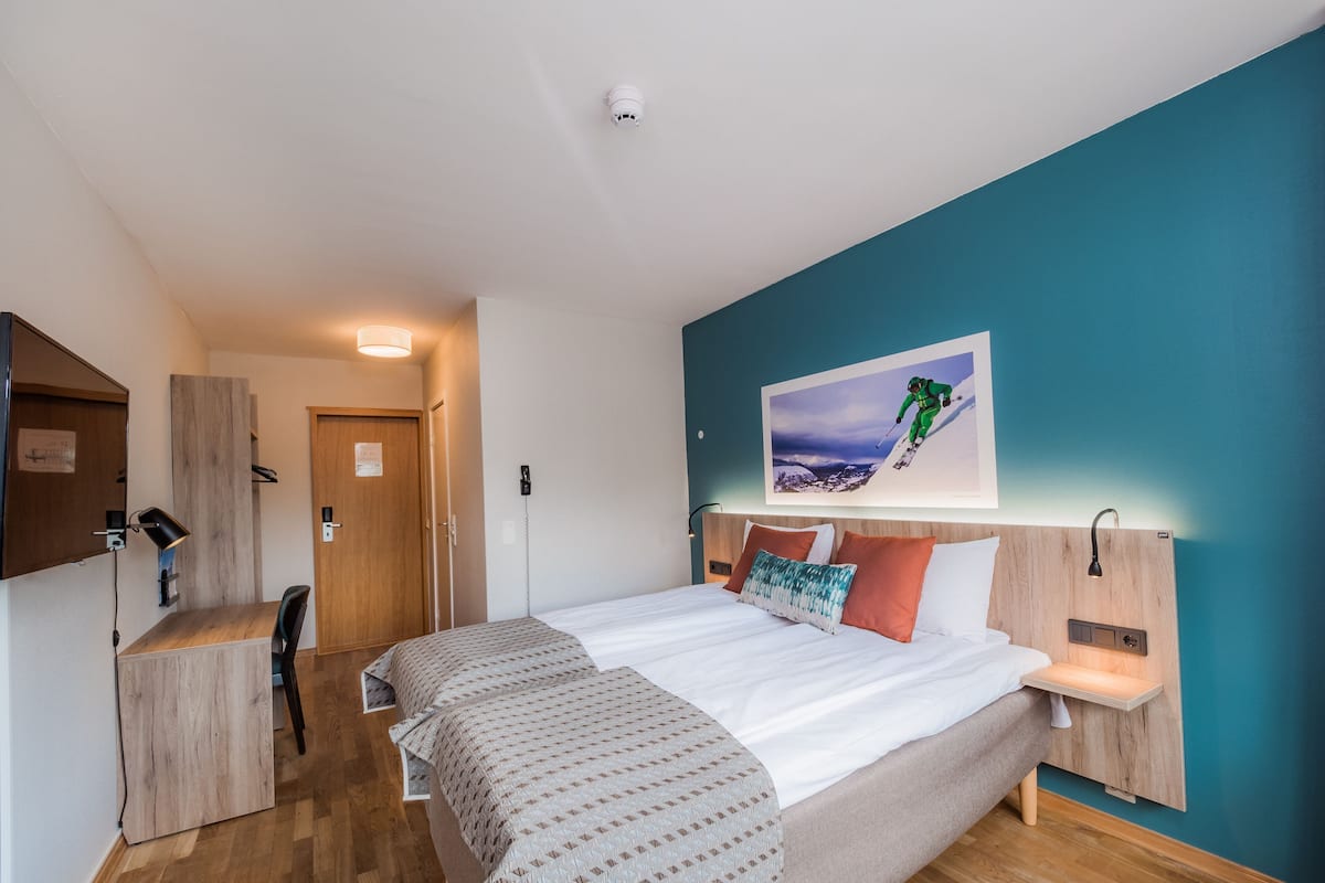 Desk, free WiFi, bed sheets, alarm clocks