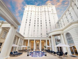 Outdoor pool, open 8:00 AM to 8:00 PM, pool umbrellas, pool loungers