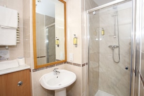 Shower, free toiletries, hair dryer, towels
