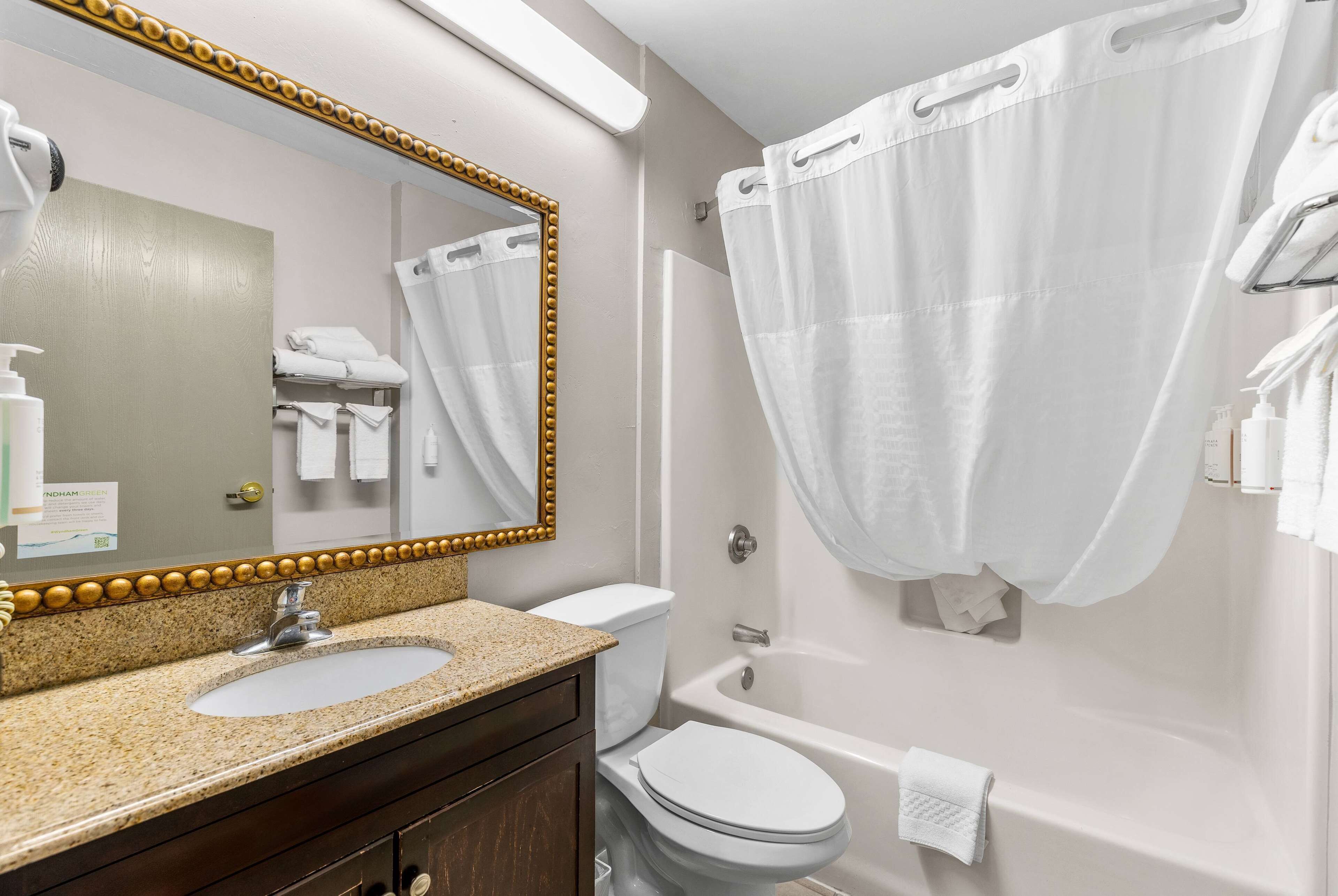 eco-friendly toiletries, hair dryer, towels, soap