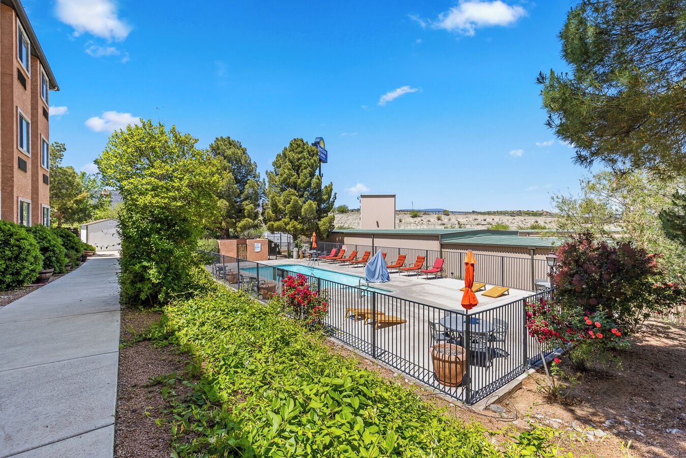 seasonal outdoor pool, open 9:00 am to 10:00 pm, pool umbrellas