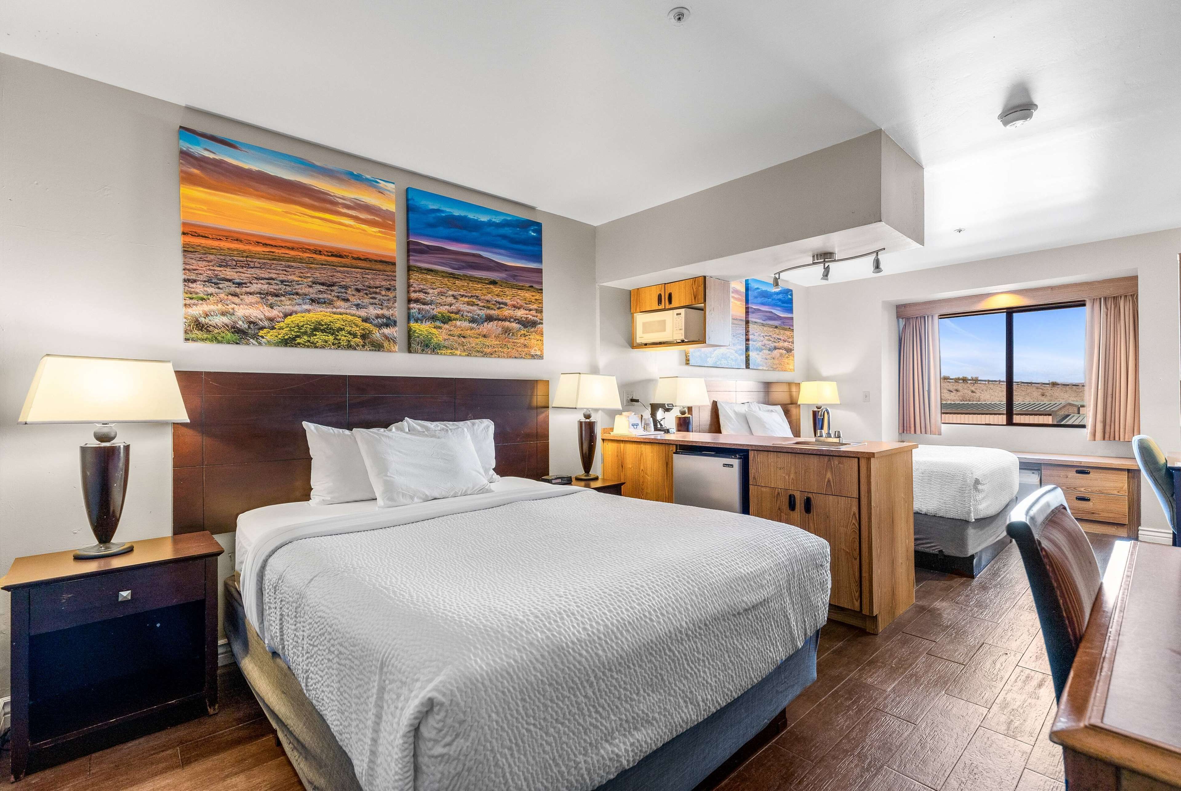 desk, laptop workspace, blackout curtains, free cots/infant beds