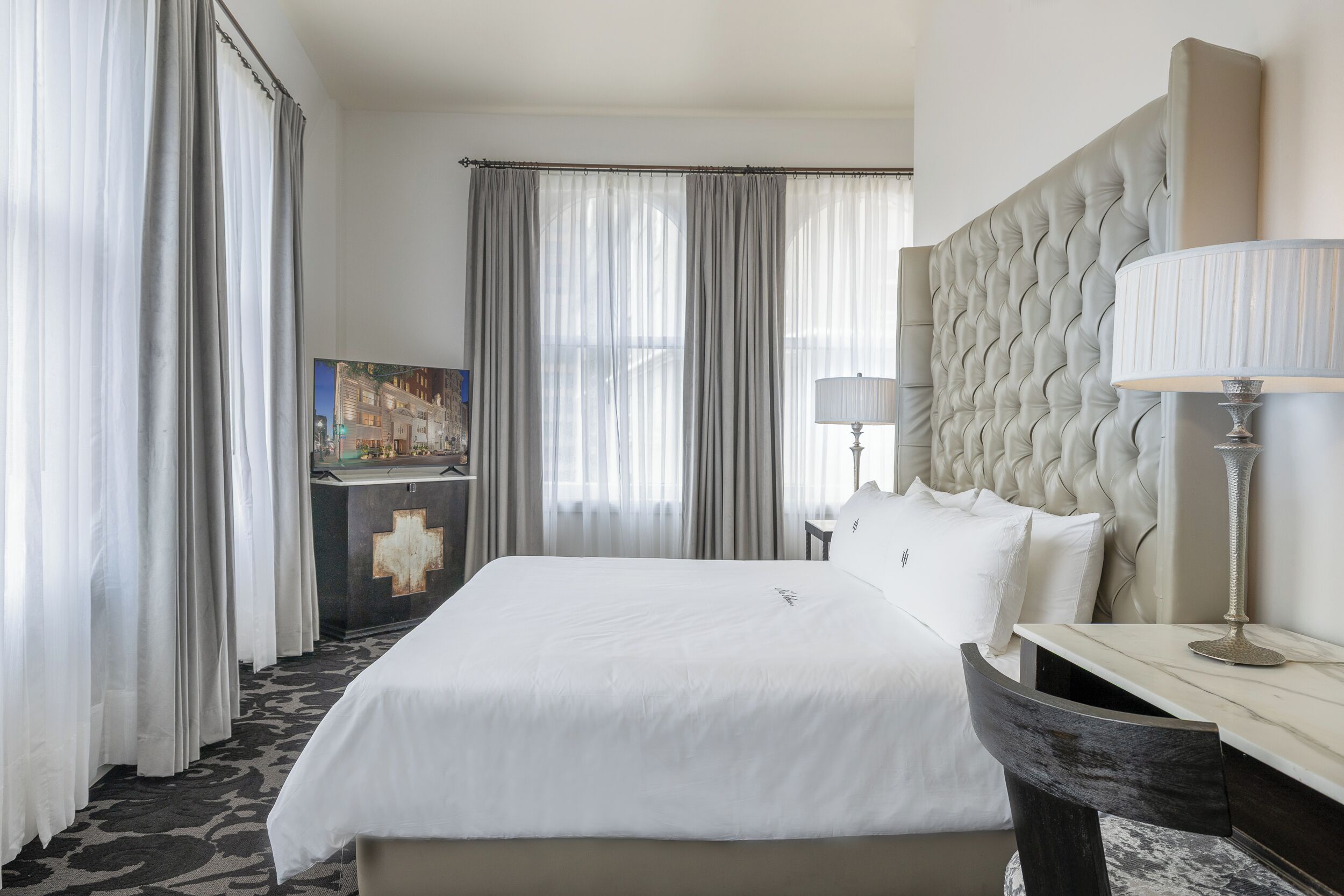 superior room, 1 king bed, city view, corner (panoramic corner king room (pck)) | premium bedding, laptop workspace, iron/ironing board, travel cot