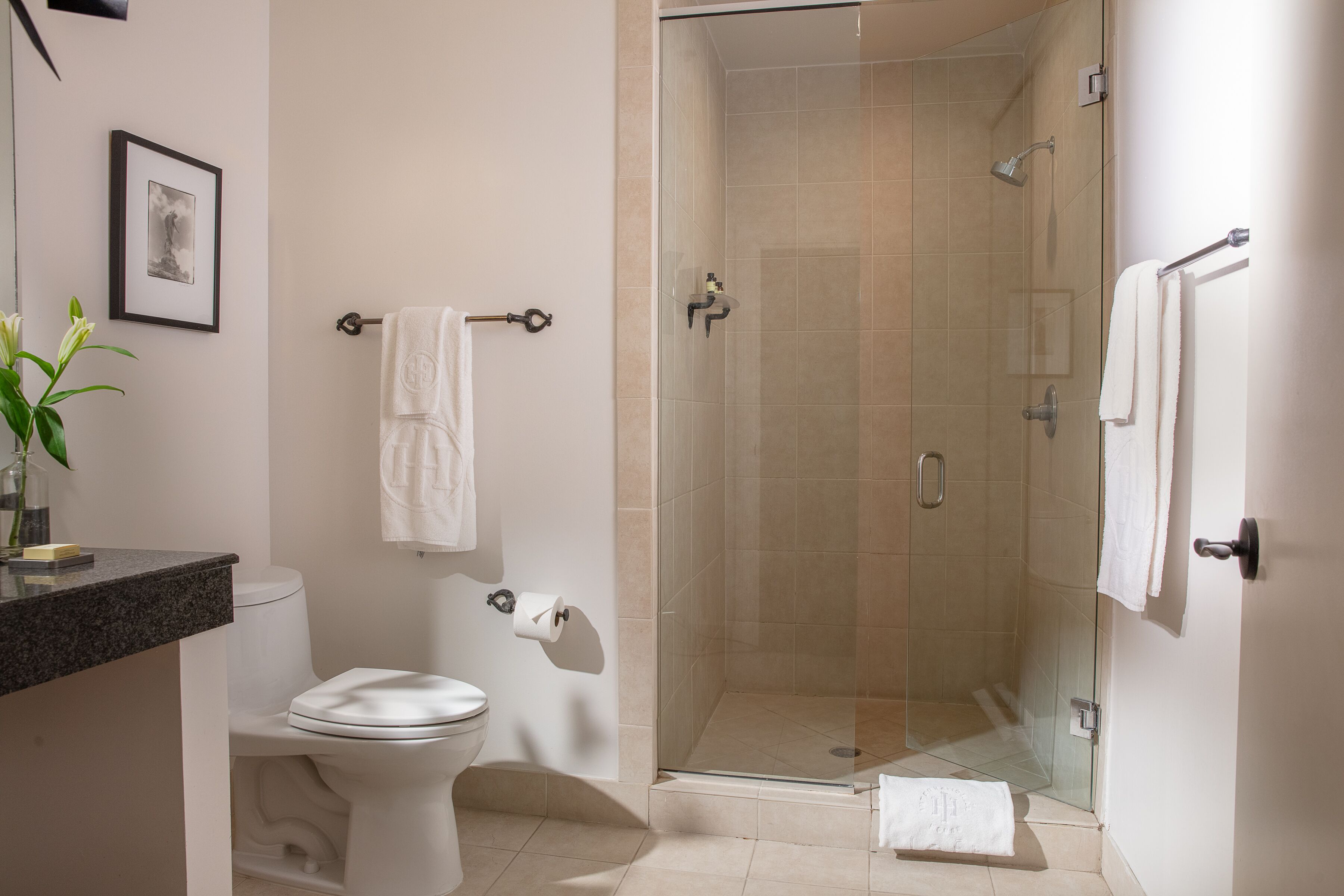 designer toiletries, hair dryer, bathrobes, towels