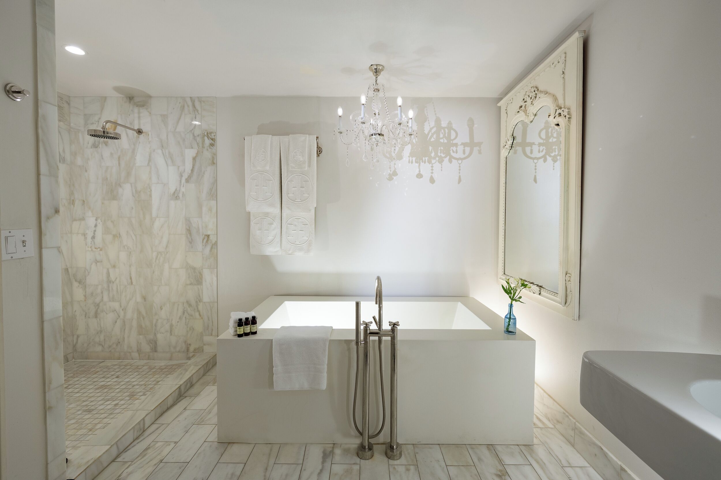 designer toiletries, hair dryer, bathrobes, towels