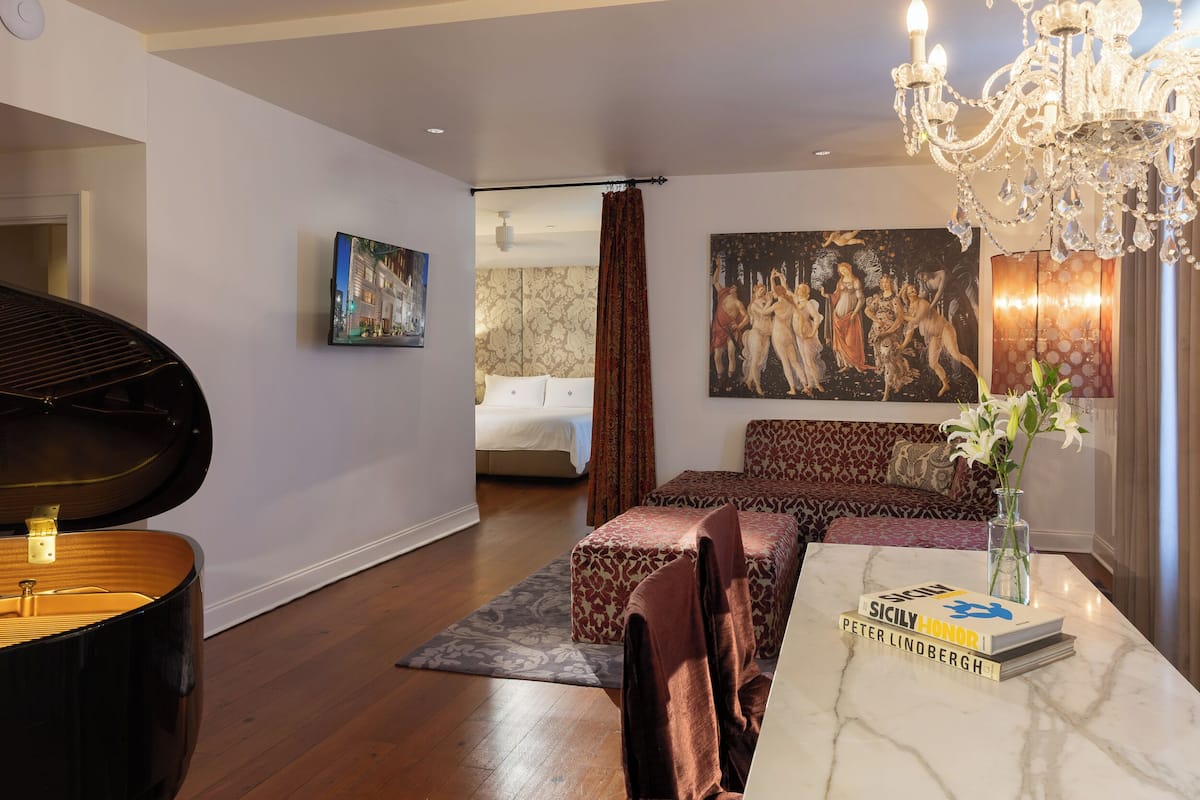 Presidential Penthouse, 1 King Bed, City View (Muse King Terrace Penthouse (MTP)) | Living area | 46-inch LCD TV with cable channels, TV, iPod dock