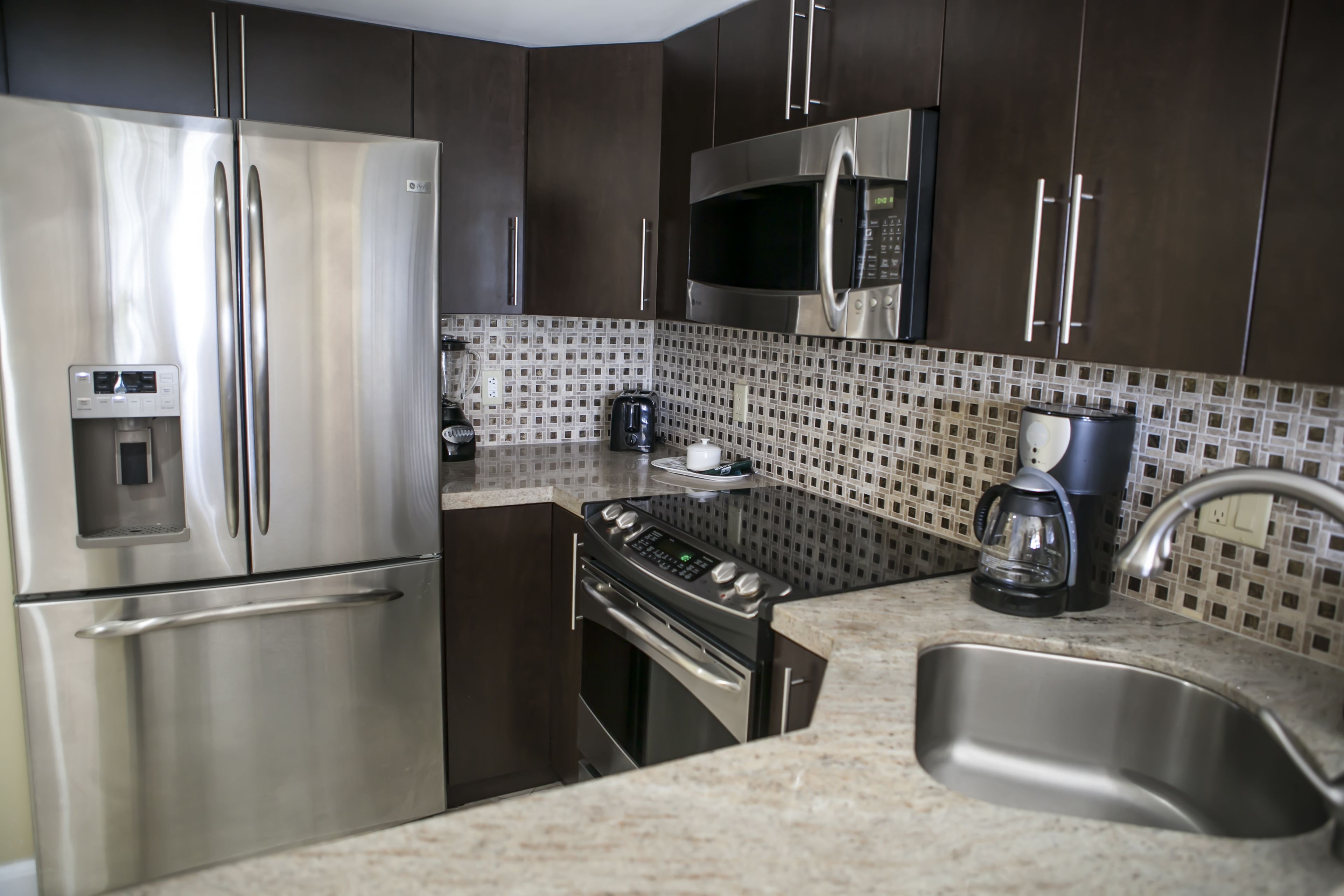 superior room, multiple beds | private kitchen | full-sized fridge, microwave, coffee/tea maker, cookware/dishes/utensils