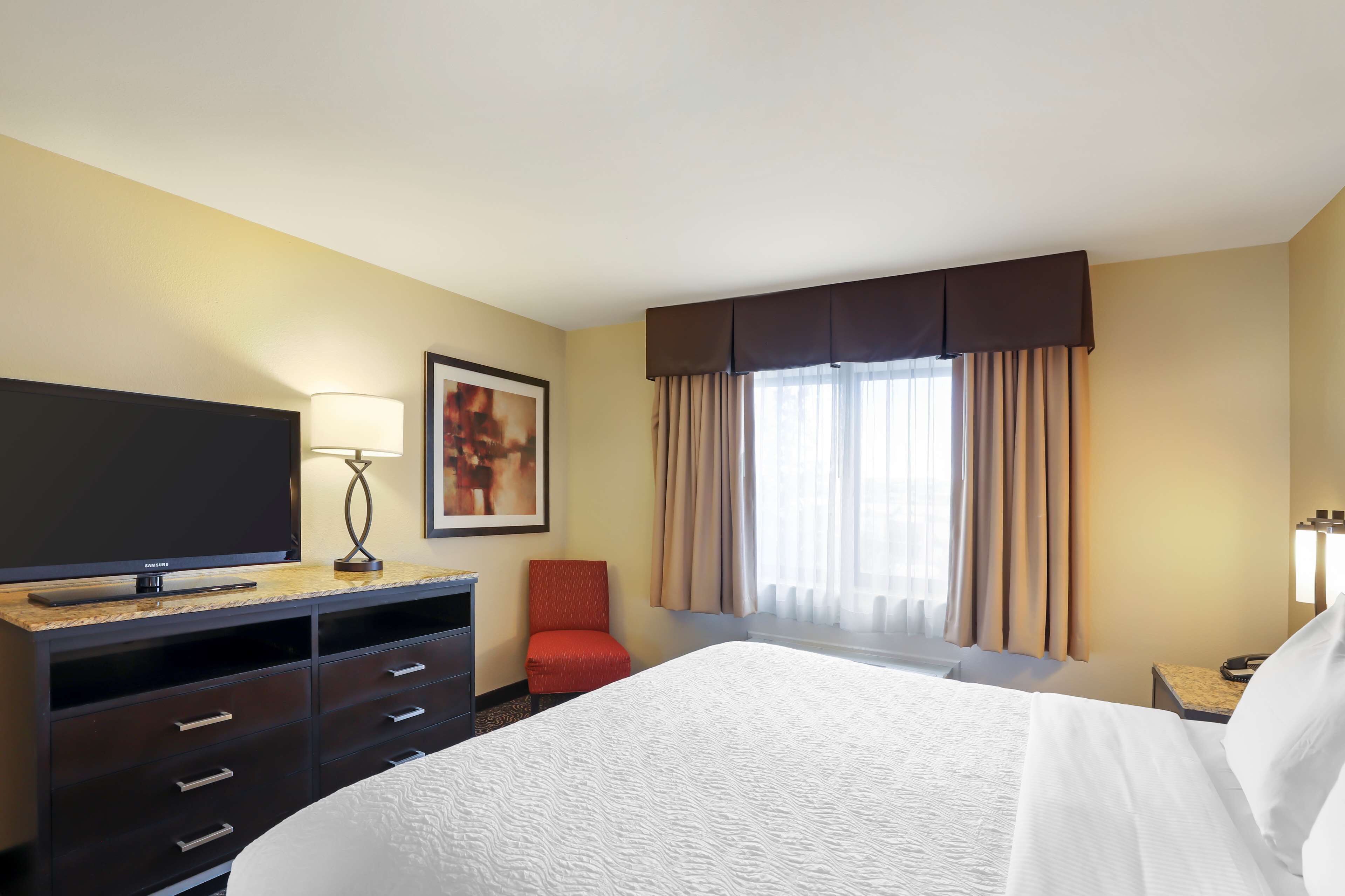 suite, 1 king bed, balcony, mountain view | 1 bedroom, desk, laptop workspace, blackout curtains