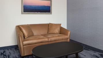 Premium bedding, desk, laptop workspace, blackout drapes