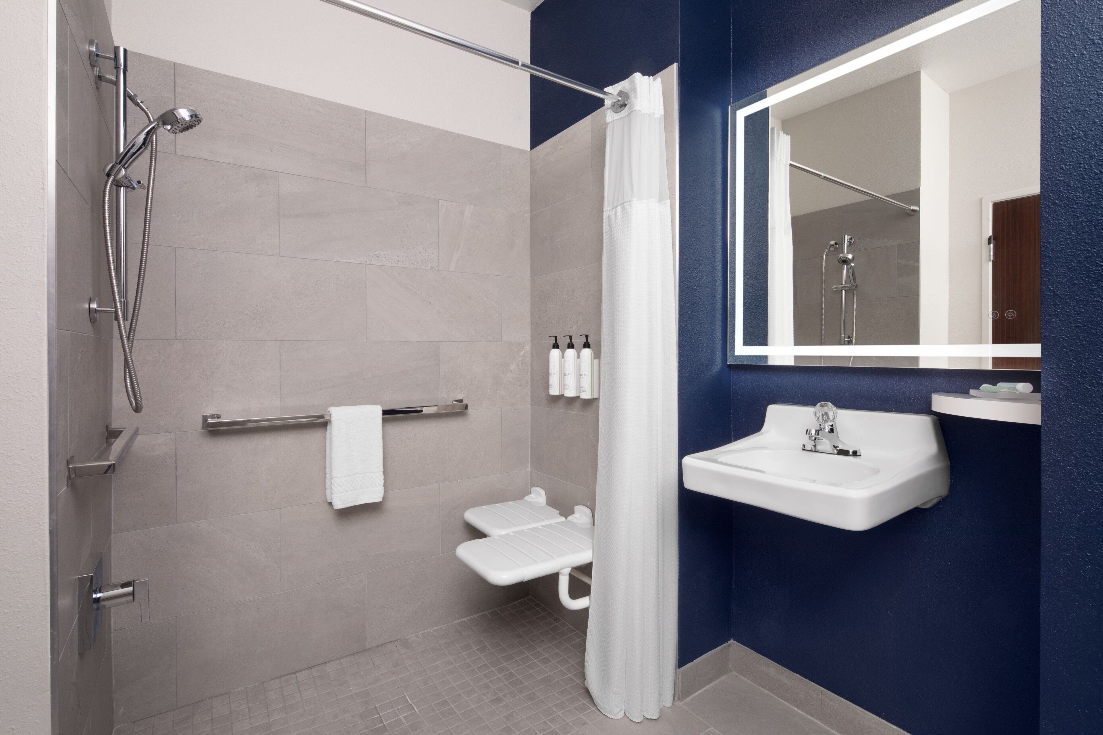 separate bathtub and shower, free toiletries, hair dryer, towels