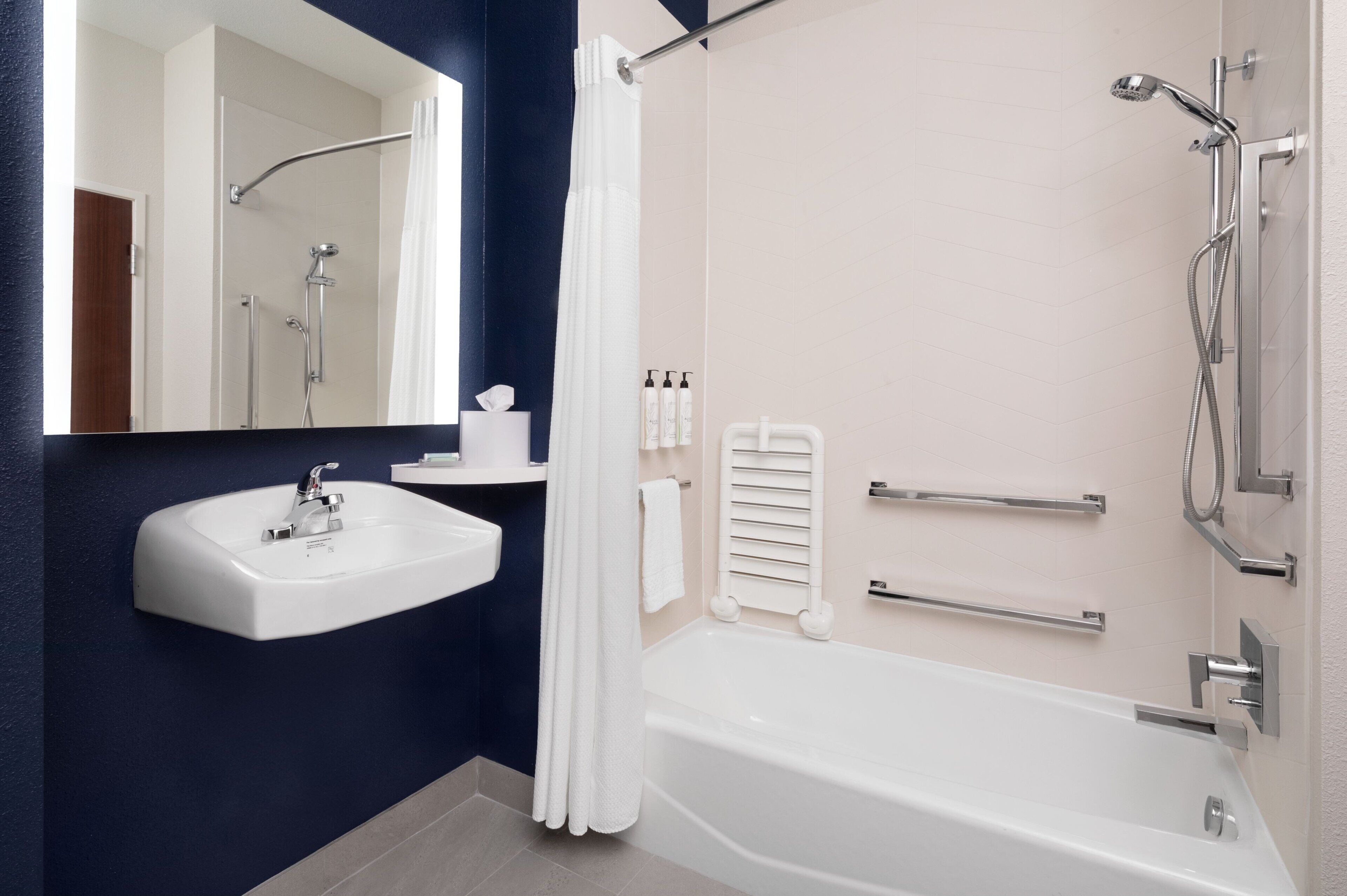 separate bathtub and shower, free toiletries, hair dryer, towels