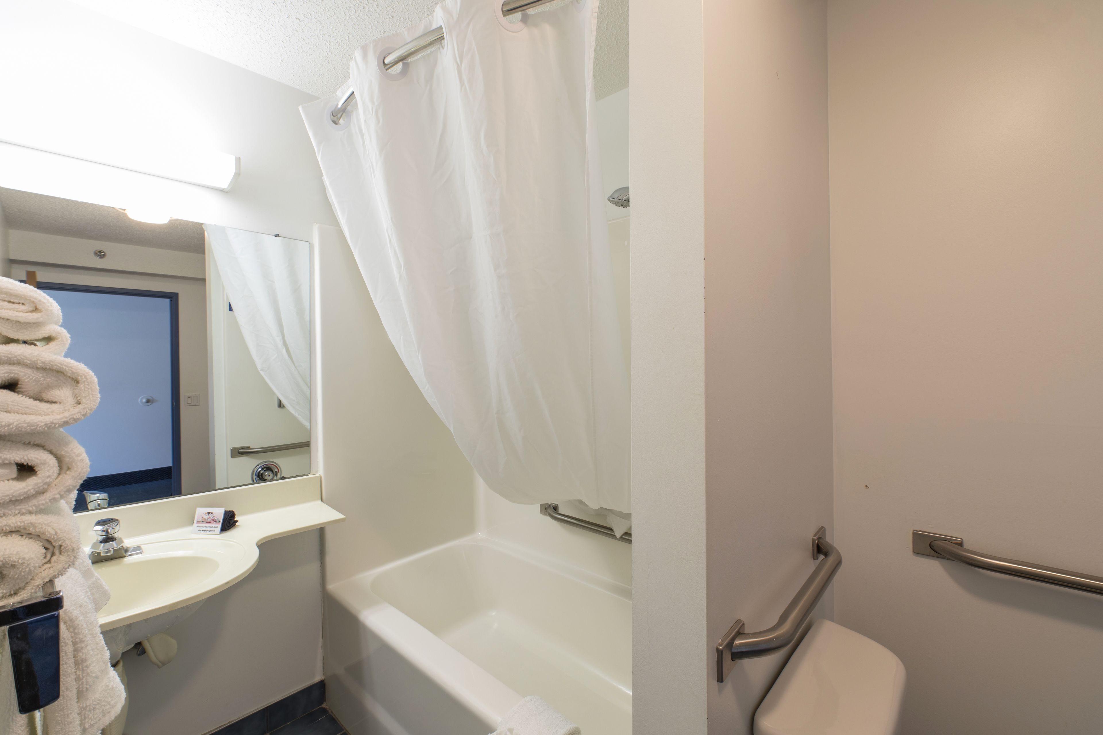 combined shower/bathtub, free toiletries, hair dryer, towels