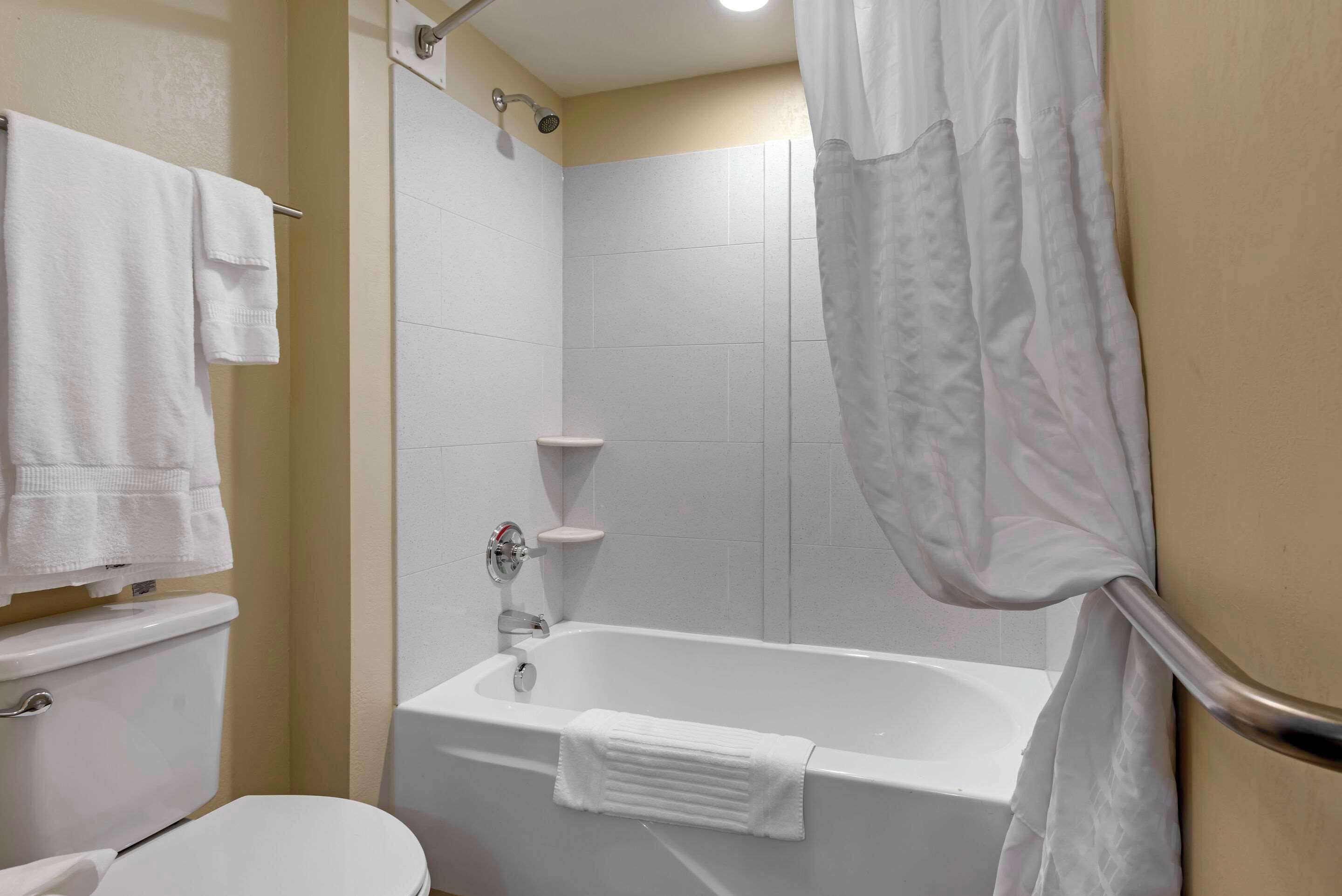 standard room, 2 queen beds, non smoking | premium bedding, desk, blackout curtains, iron/ironing board