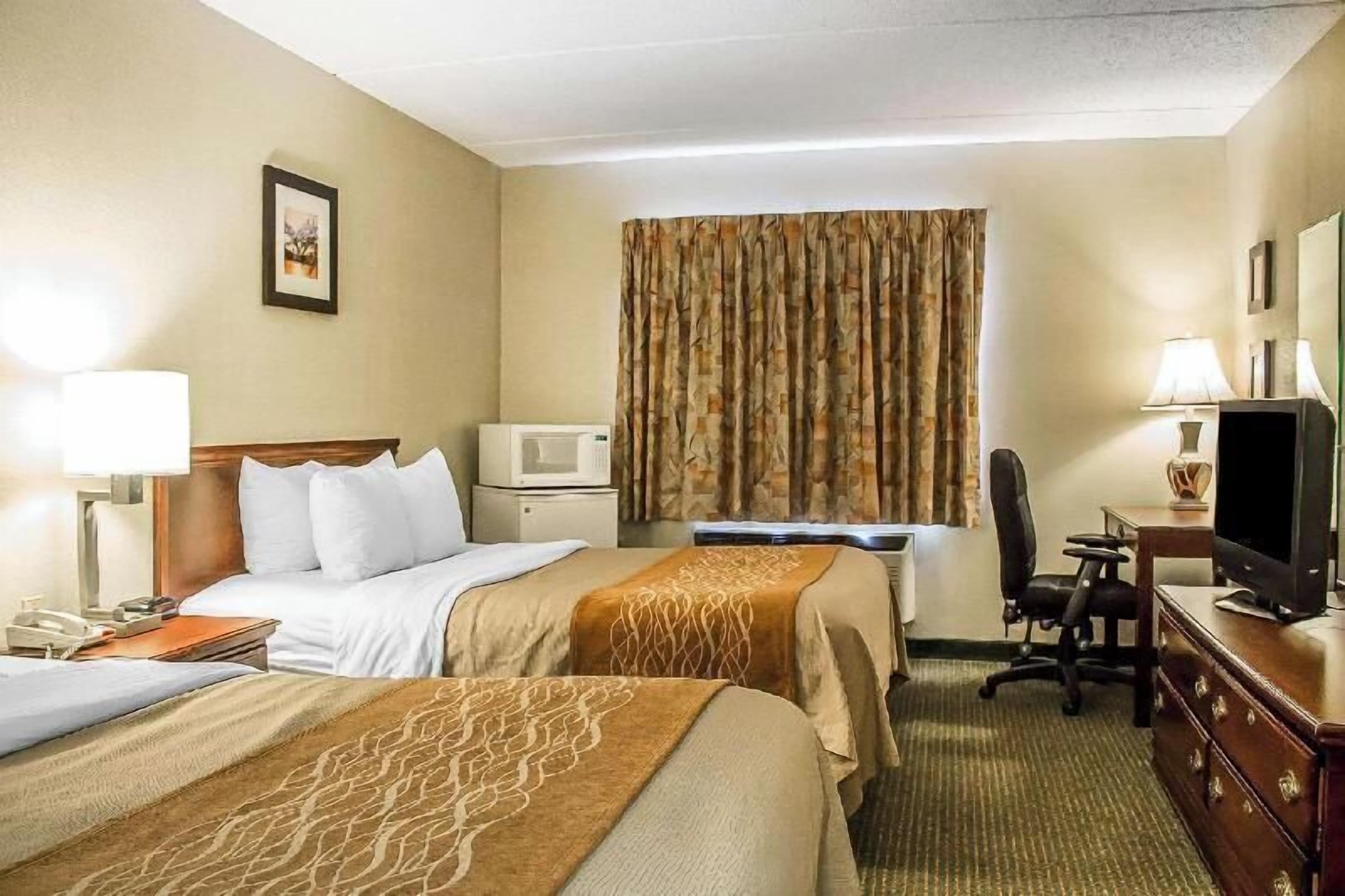 Premium bedding, desk, blackout drapes, iron/ironing board