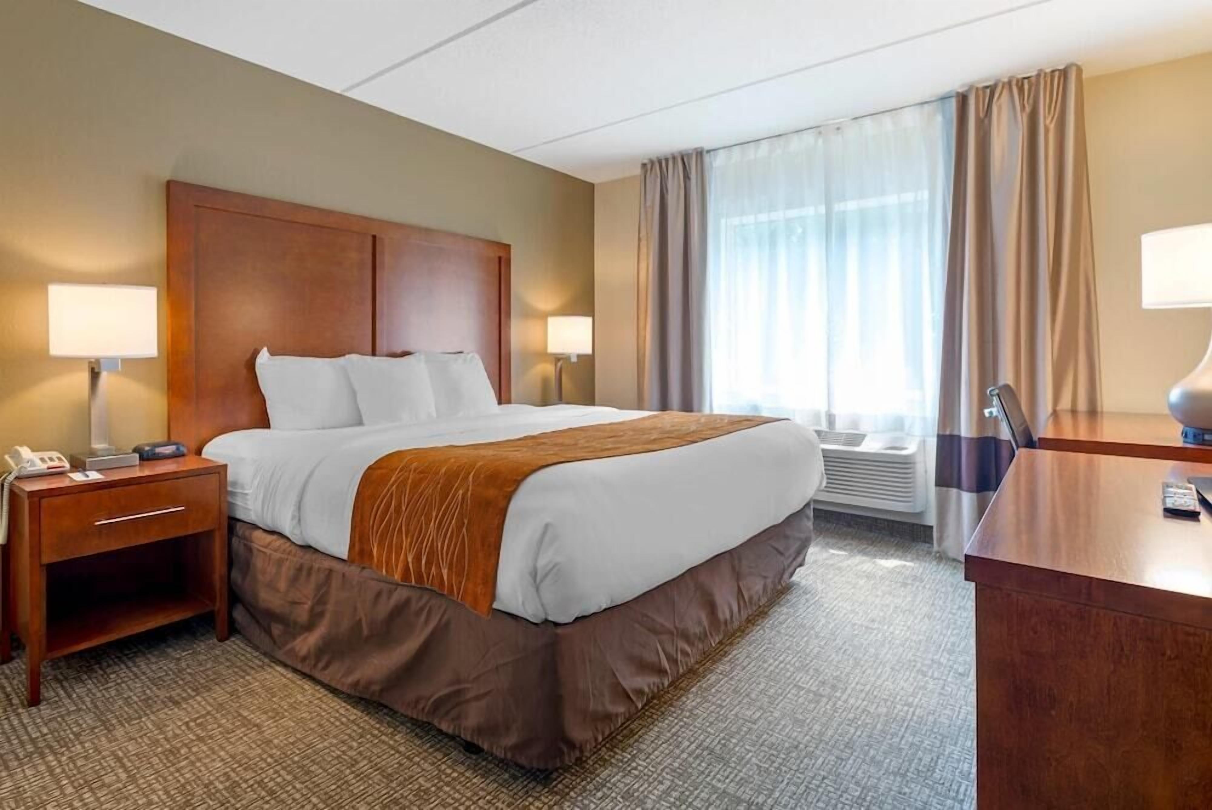 Premium bedding, desk, blackout drapes, iron/ironing board
