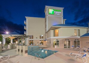 Seasonal outdoor pool, open 10 AM to 10 PM, pool loungers