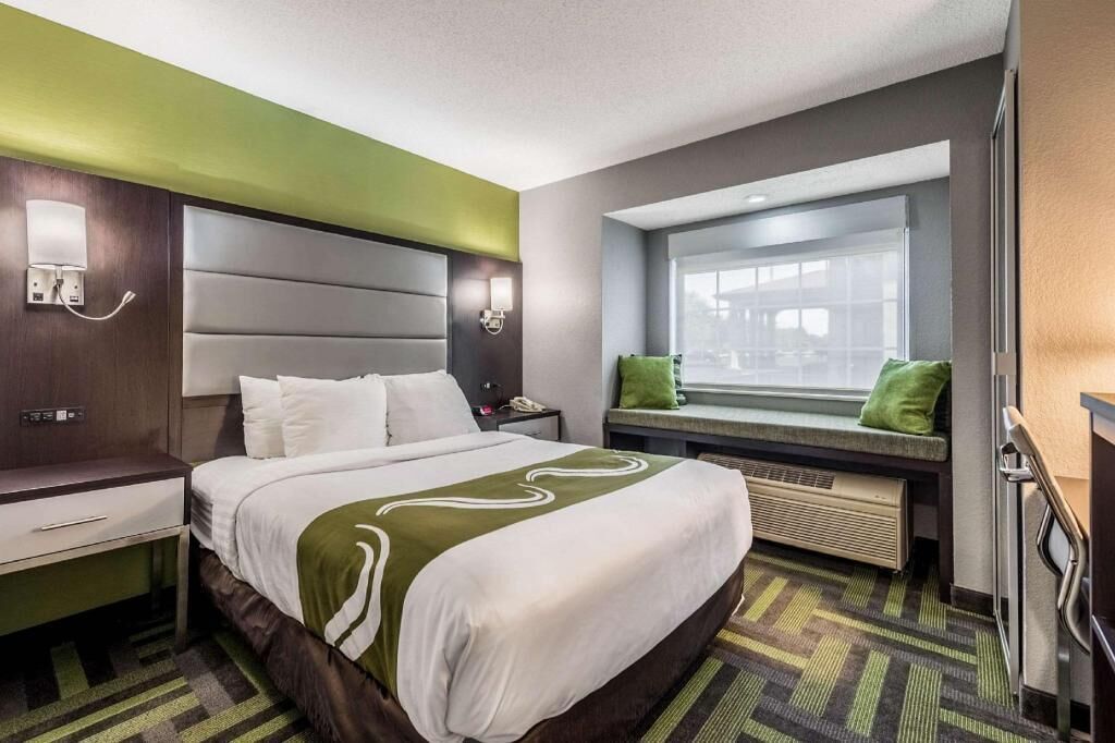 Desk, laptop workspace, blackout curtains, iron/ironing board