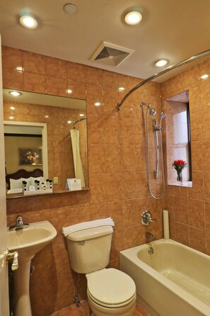 Deluxe Room, 2 Queen Beds | Bathroom | Combined shower/tub, free toiletries, hair dryer, towels