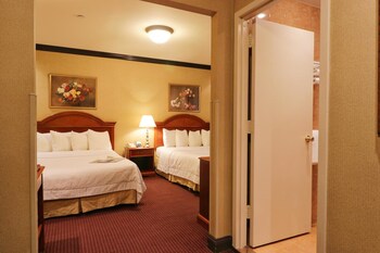 In-room safe, desk, blackout drapes, soundproofing at Hotel Newton