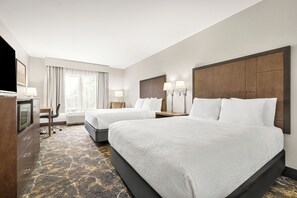 Premium bedding, pillowtop beds, desk, laptop workspace