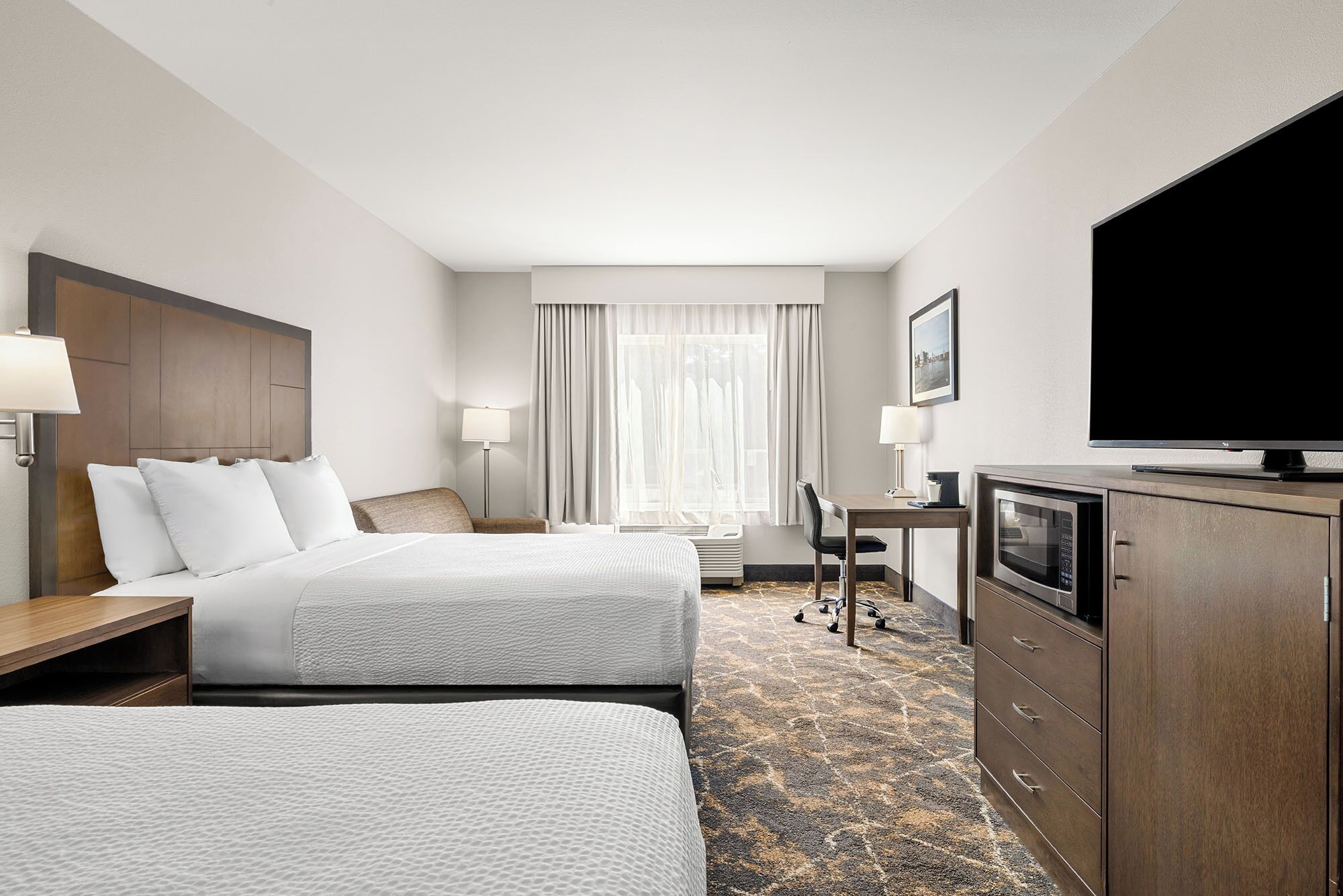 deluxe room, multiple beds | premium bedding, pillow-top beds, desk, laptop workspace