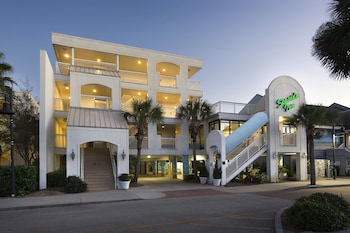 Front of property - evening/night at Seaside Inn Oceanfront
