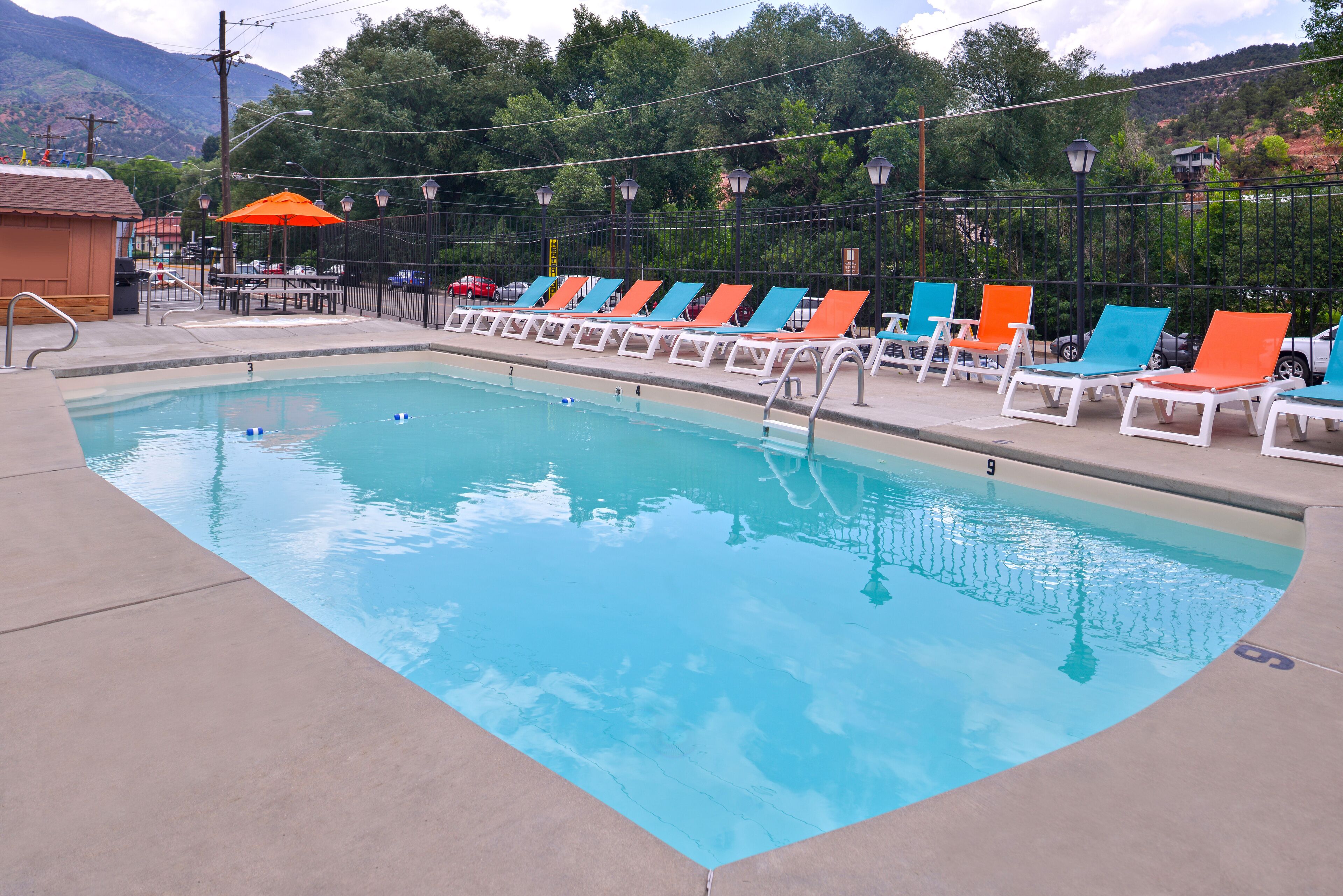 seasonal outdoor pool, pool loungers