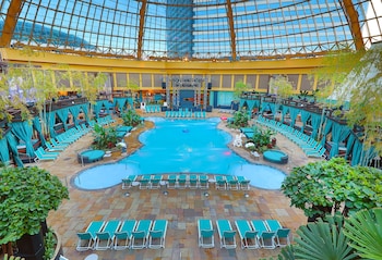 Indoor pool, cabanas (surcharge), sun loungers at Harrahs Resort Atlantic City