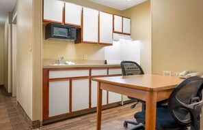 Desk, laptop workspace, blackout curtains, iron/ironing board