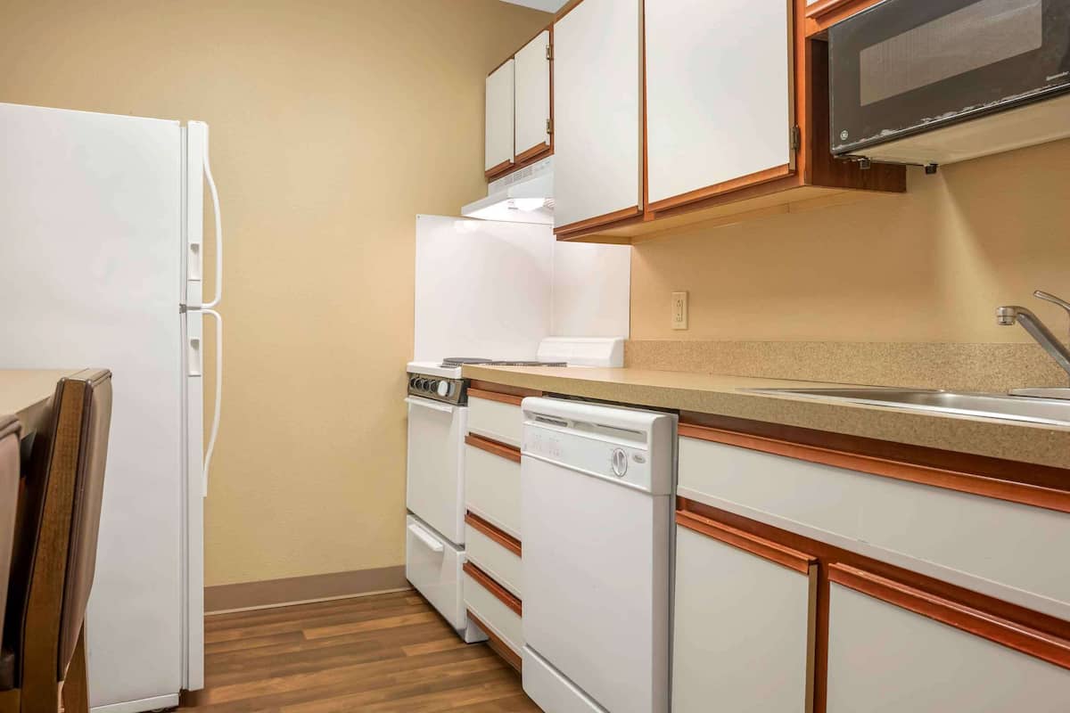 deluxe studio, 1 queen bed with sofa bed, non smoking | desk, laptop workspace, blackout curtains, iron/ironing board