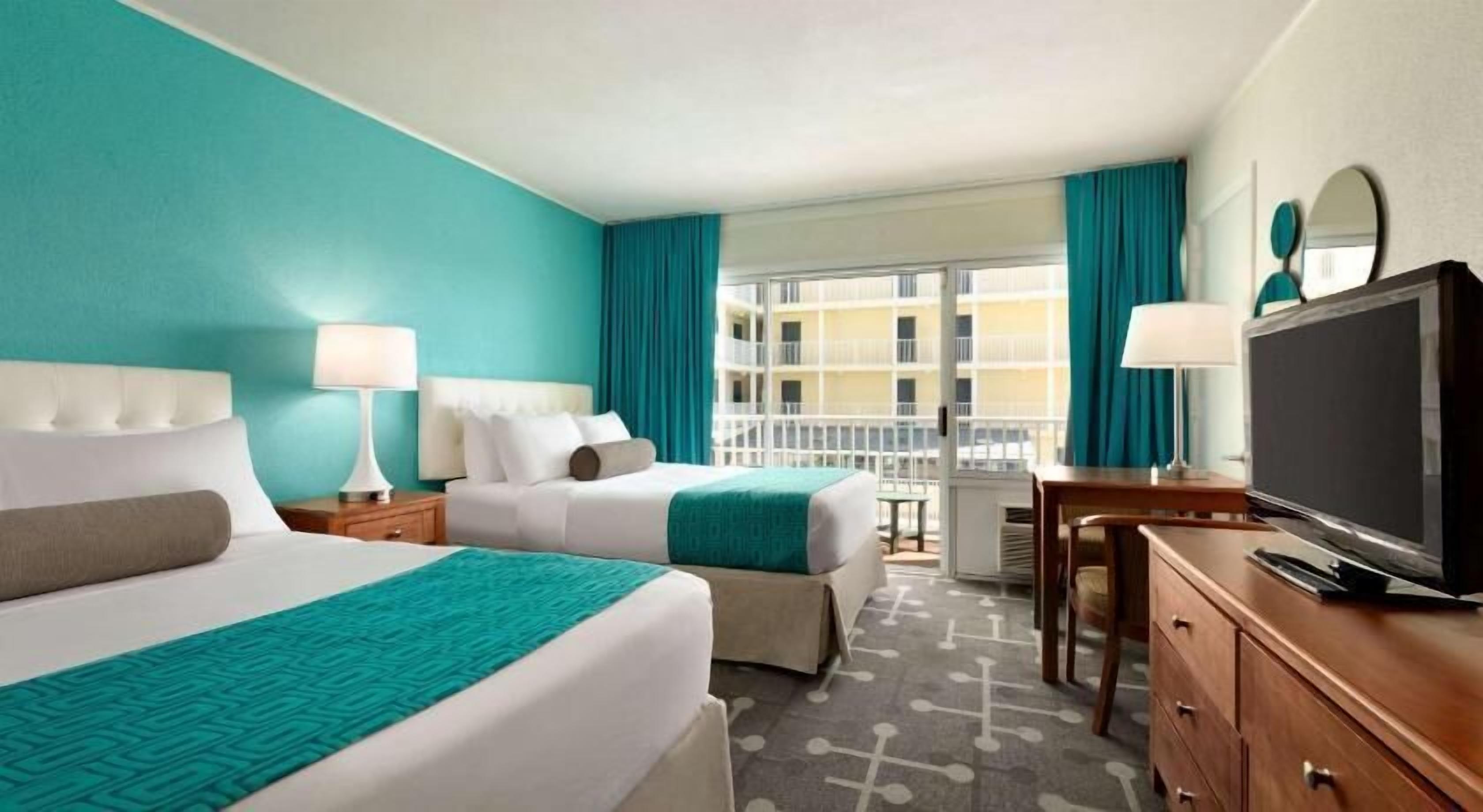 Desk, blackout curtains, iron/ironing board, free cots/infant beds