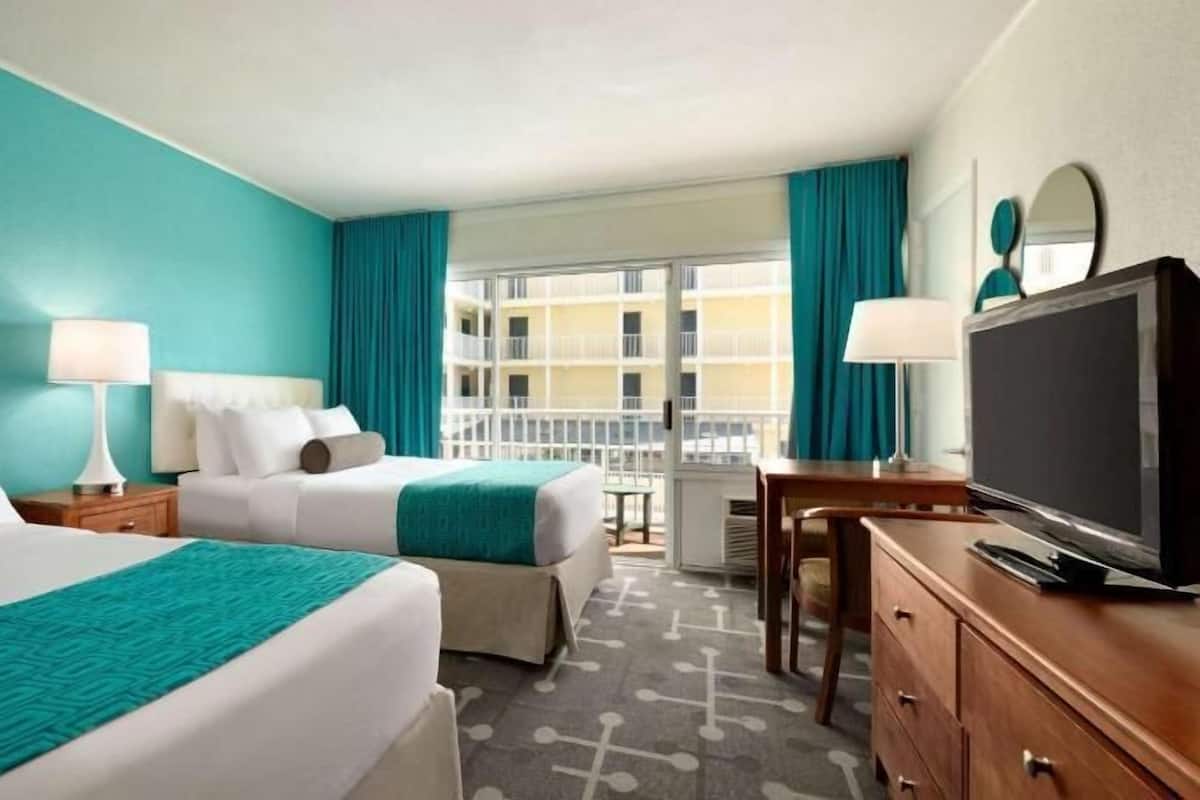 Desk, blackout curtains, iron/ironing board, free cots/infant beds