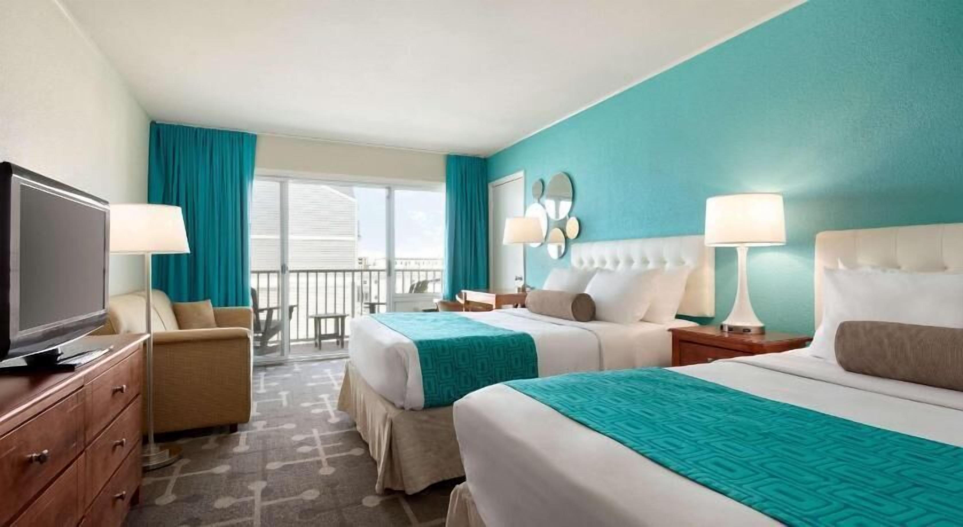 Desk, blackout curtains, iron/ironing board, free cots/infant beds