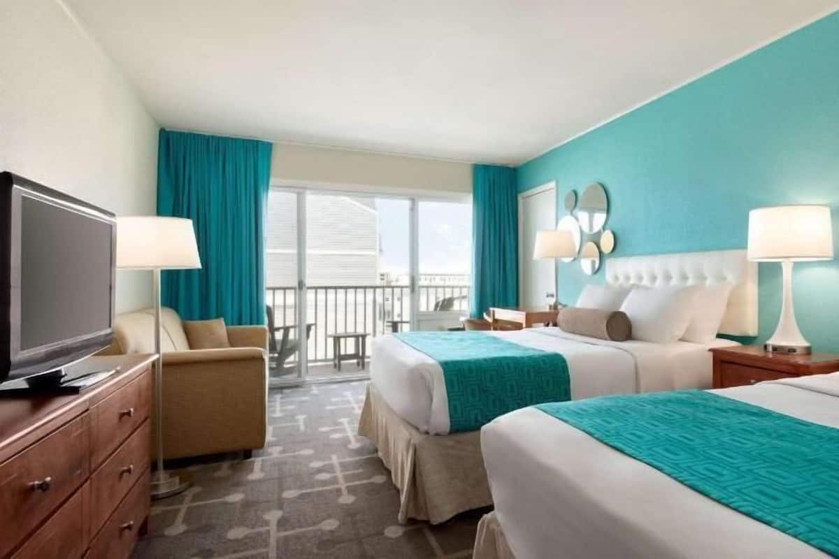 Desk, blackout curtains, iron/ironing board, free cots/infant beds