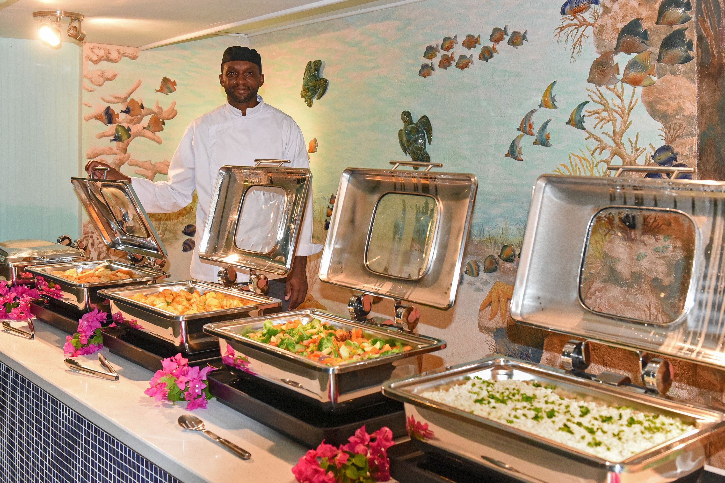 breakfast, lunch, dinner served; beach views