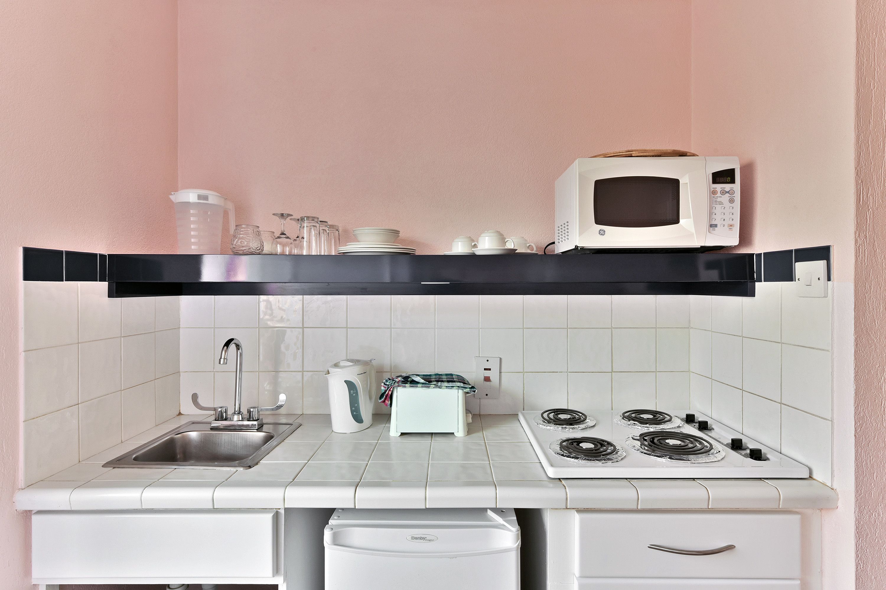 superior studio, pool view | private kitchenette | electric kettle