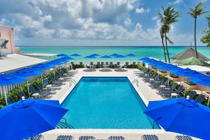 2 outdoor pools, pool umbrellas, sun loungers